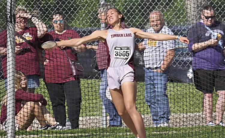 Timber Lake’s Jasmine Nash throws the discus at the South Dakota Class B Track Meet in Sioux Falls last week. Nash, a senior, broke her own school record in the shot put with a throw of 39-07.75 to finish second overall and placed third in the discus with a distance of 122 feet. Photo by Marie DuPreez