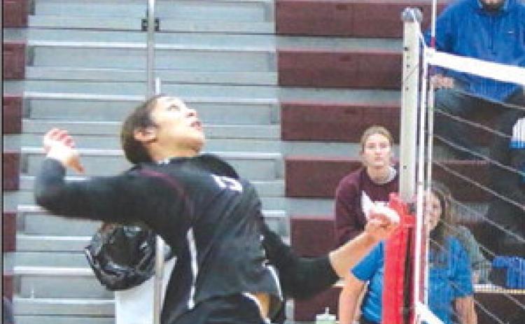 Timber Lake junior middle hitter Jasmine Nash goes up for one of the powerful kill spikes she is known for around the Little Moreau Conference during action at the LMC Volleyball Tournament held Saturday, Sept. 23, in Timber Lake. Photo by Jon Flatland