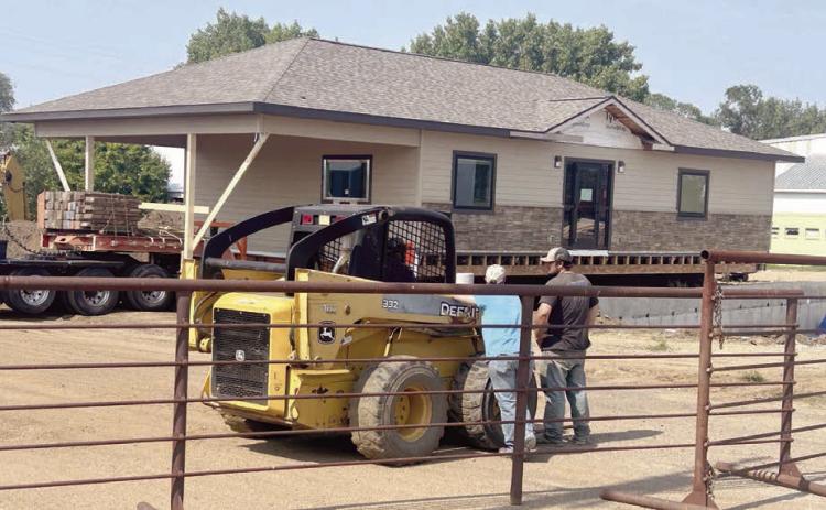 A new building for Western Dakota Bank’s Isabel branch rolled into town last week and was placed on its foundation. Built by Custom Touch Homes in Madison, the building is located on Highway 20 just south of the Isabel Community Center and includes a drive-through window. Western Dakota Bank is shooting for a November opening date in the new location. Photo by Jon Flatland