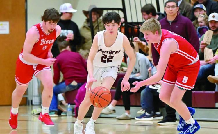 Pistol Pete ... Timber Lake freshman guard Pete Maher (22) heads upcourt after stealing the ball from a Bison player during the Panthers’ 55-51 win over the Cardinals last week. Maher came off the bench to score 15 points in the matchup. Timber Lake, 12-6 overall, travel to Eagle Butte Thursday, Feb. 20, to take on the 13-4 Braves in a clash between Dewey County teams. The Panthers will wrap up their regular season schedule on Feb. 28 by hosting Potter County. Photo by Marie DuPreez