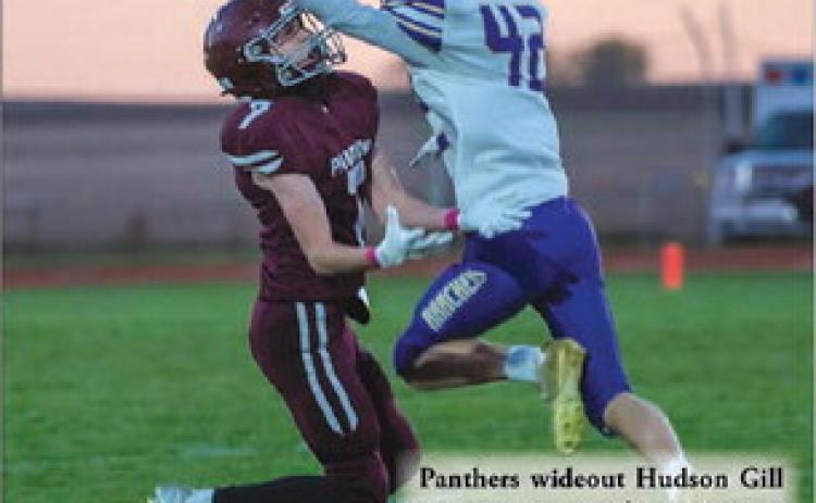 Panthers wideout Hudson Gill prepares to receive a pass as a Harding County defender ateempts to break up the play. Photo by Bob Slocum