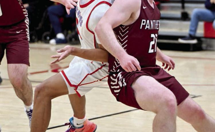 Timber Lake seniorTreyton DuPreez (right) and C-EB’s Jayden Marshall (left) battle for rebounding position during the Panthers’ loss to the Class A Braves last Tuesday, Feb. 18. See more Timber Lake boys basketball coverage on Page 10. Photo by Marie DuPreez