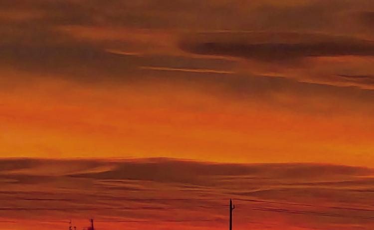 An orange sunrise sky over the region last week provided a breathtaking, vibrant display of color for those who were out of bed early enough to catch the morning spectacle to the east. The sunrise colors ushered in several days of mild winter weather after a week-long cold snap. Topic Photo/Jon Flatland
