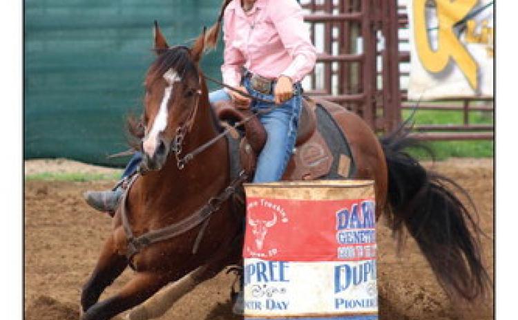 Minda Woodward of Dupree won the South Dakota Rodeo Association’s barrel racing championship this season. Besides top honors in barrels, she also finished third overall in ladies breakaway. Topic file photo by Jon Flatland